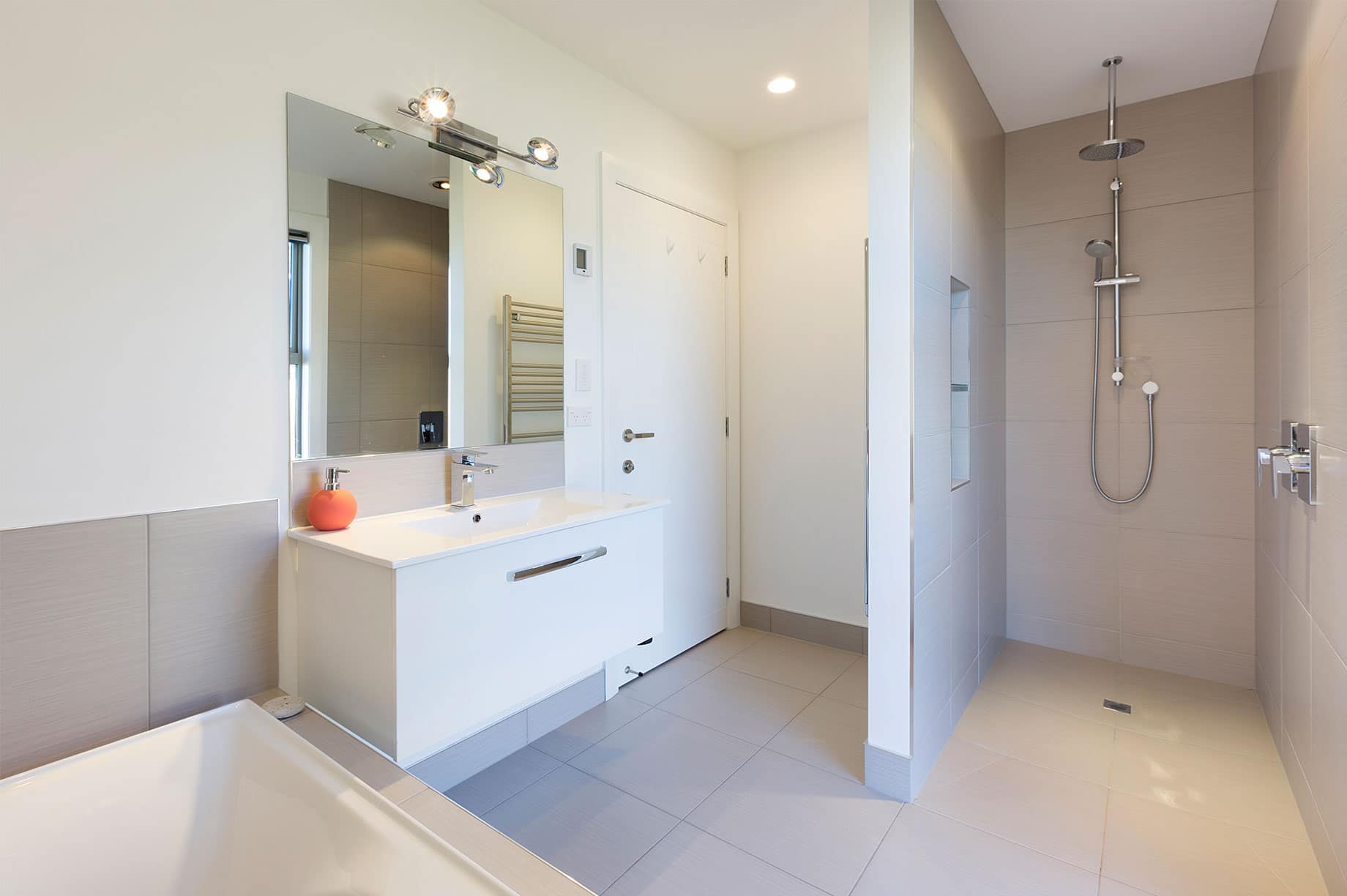White bathroom interior with a large shower