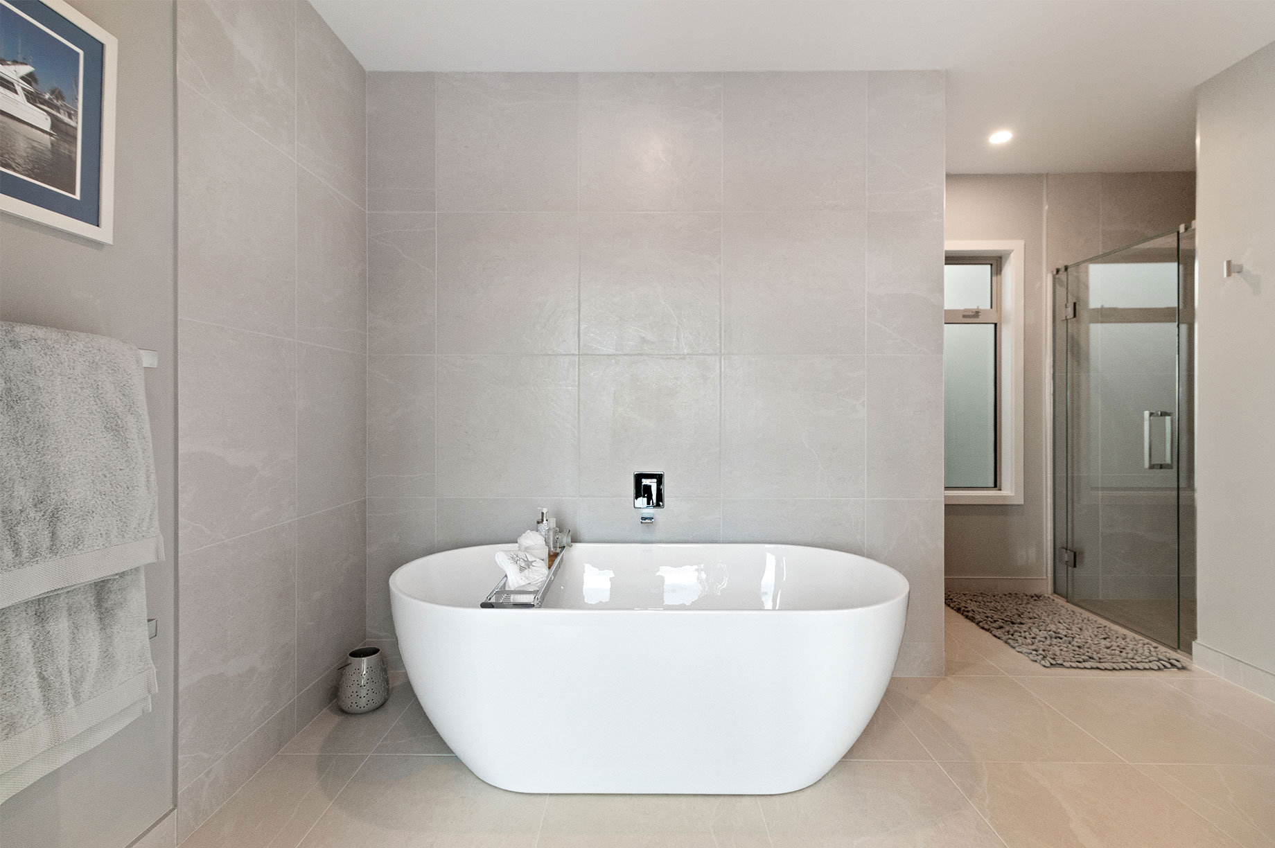 Bath in marble tile bathroom
