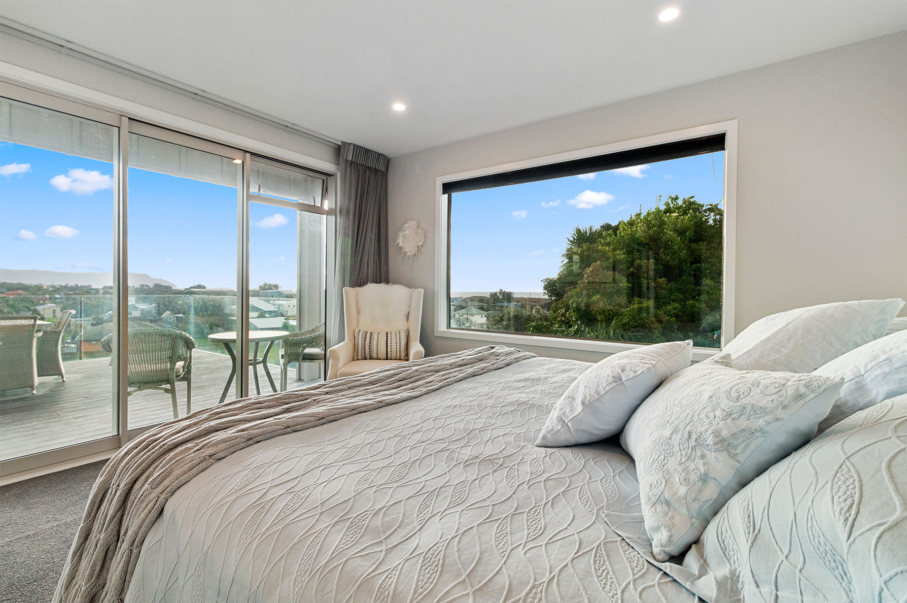 Master bedroom with a sliding door to the balcony