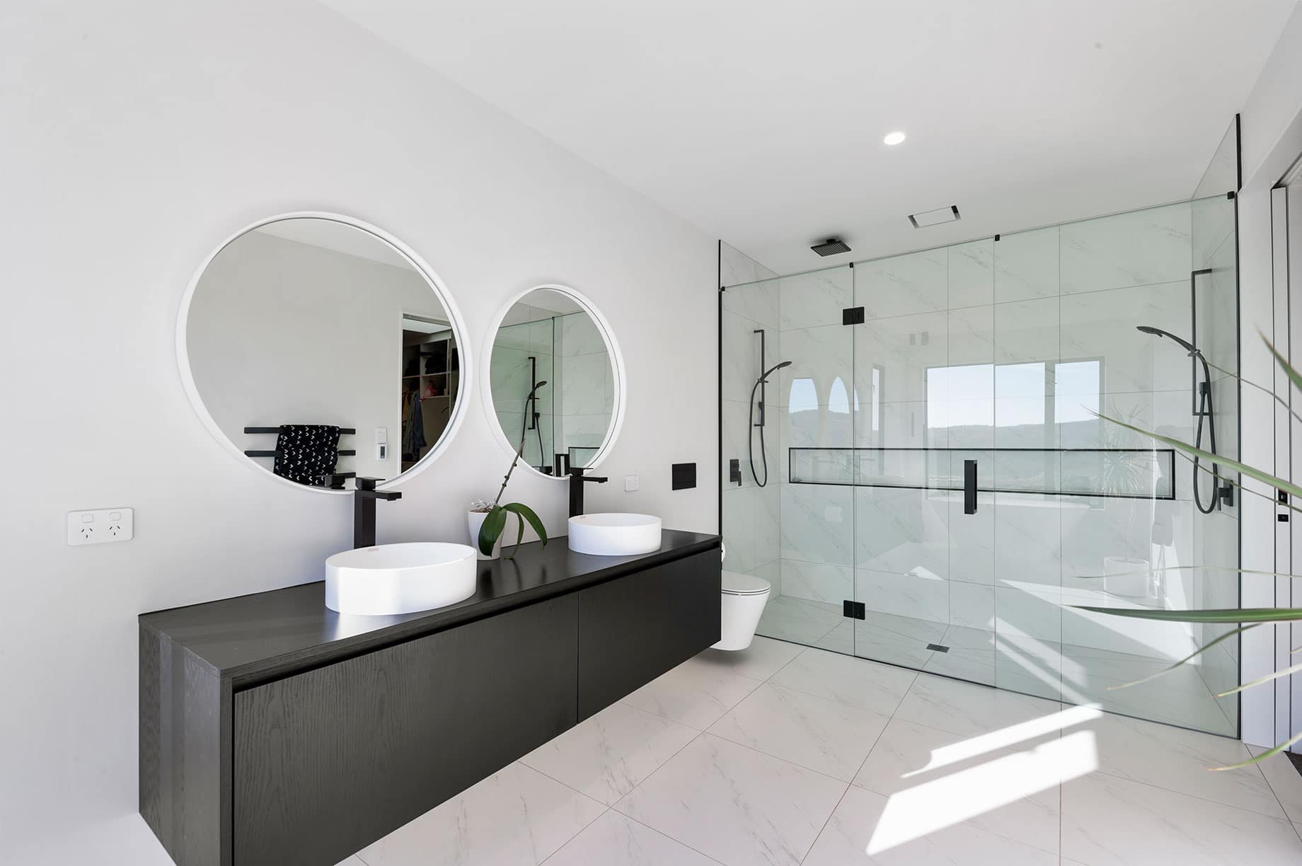 Modern bathroom interior with a dual shower