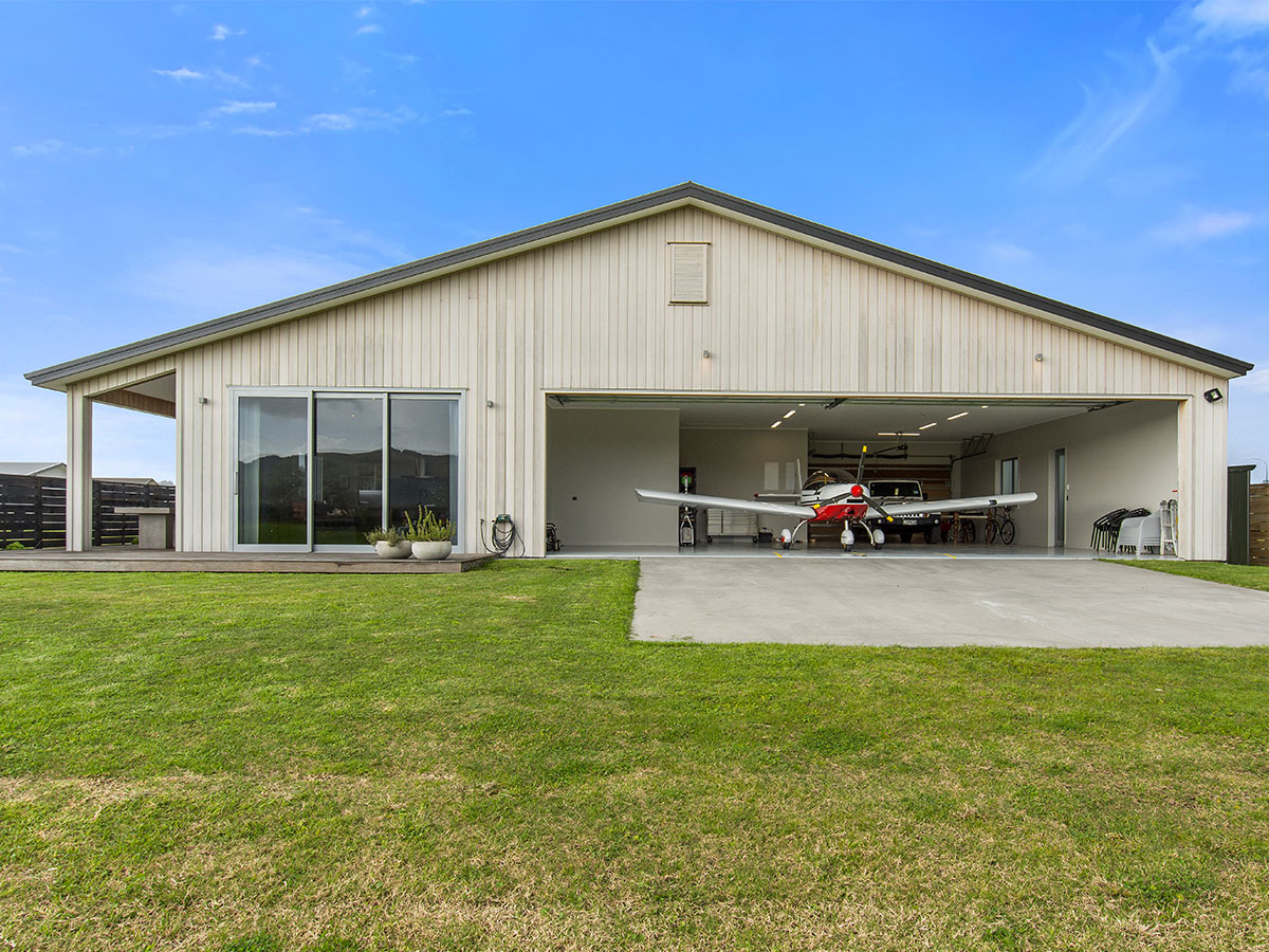 House with plane garage exterior