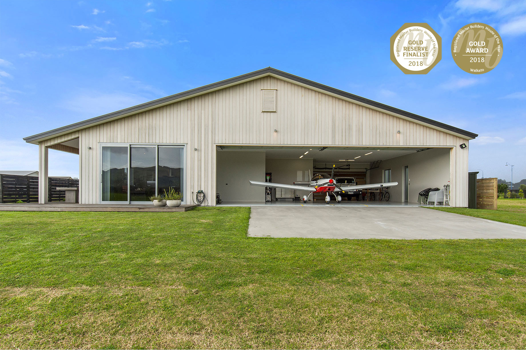 Award winning rural home with an airplane garage