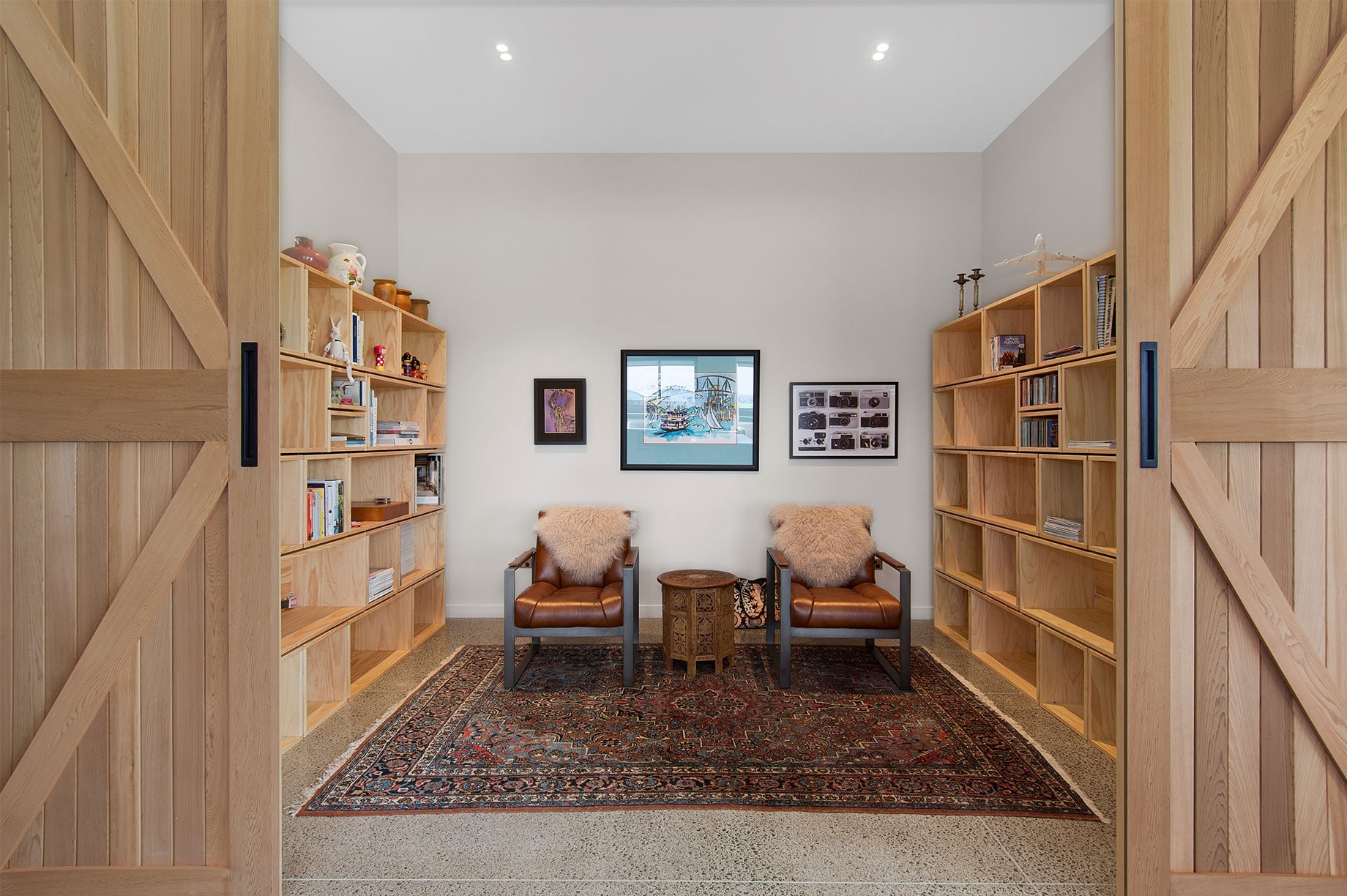 Home library interior with wooden shelves