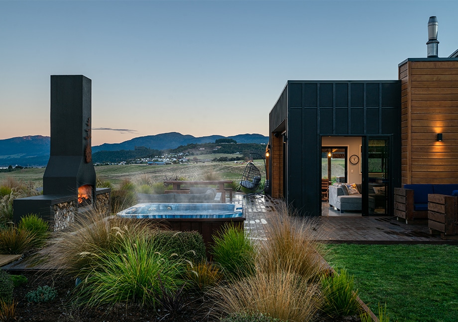 17017-external-living-fire Rural home outdoor living area with a spa