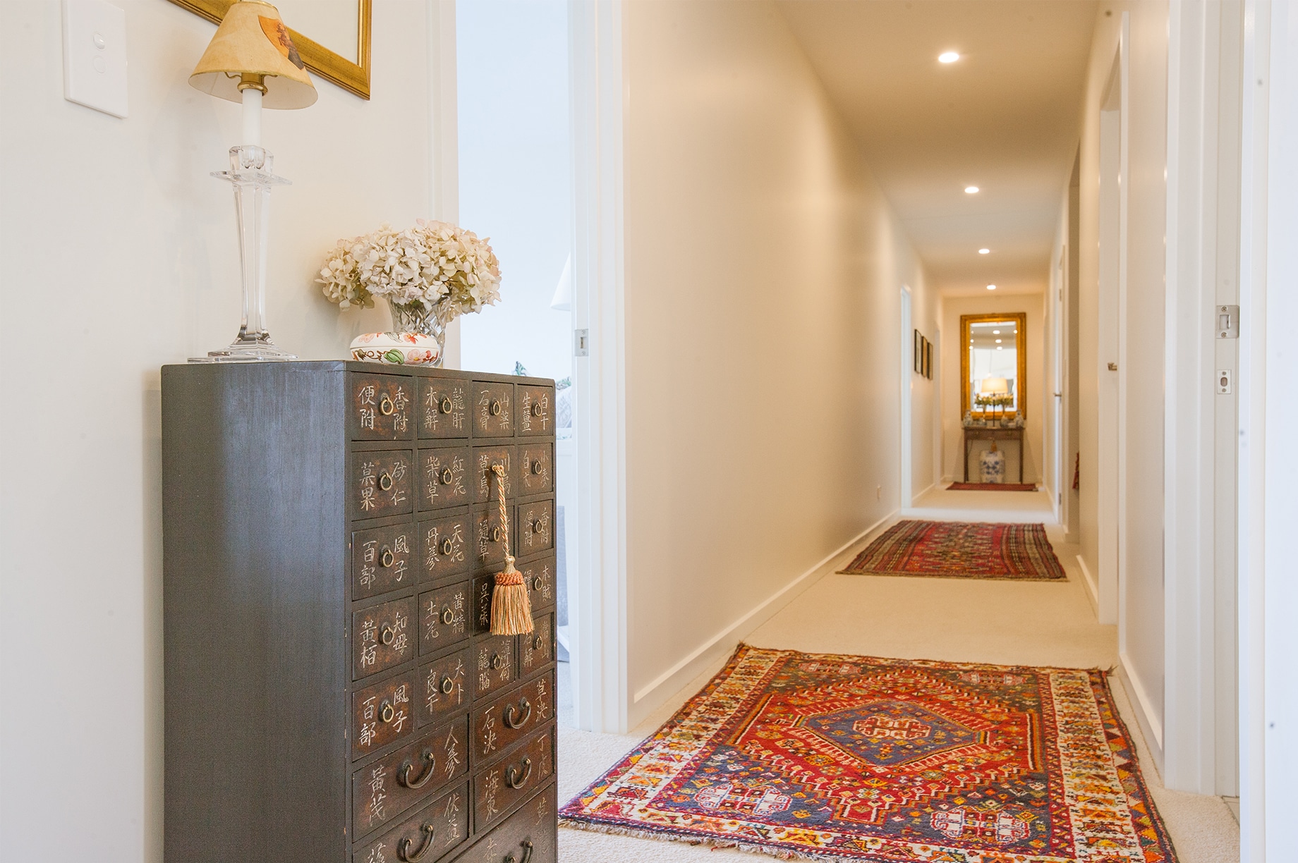 house hallway with decorative rugs interior
