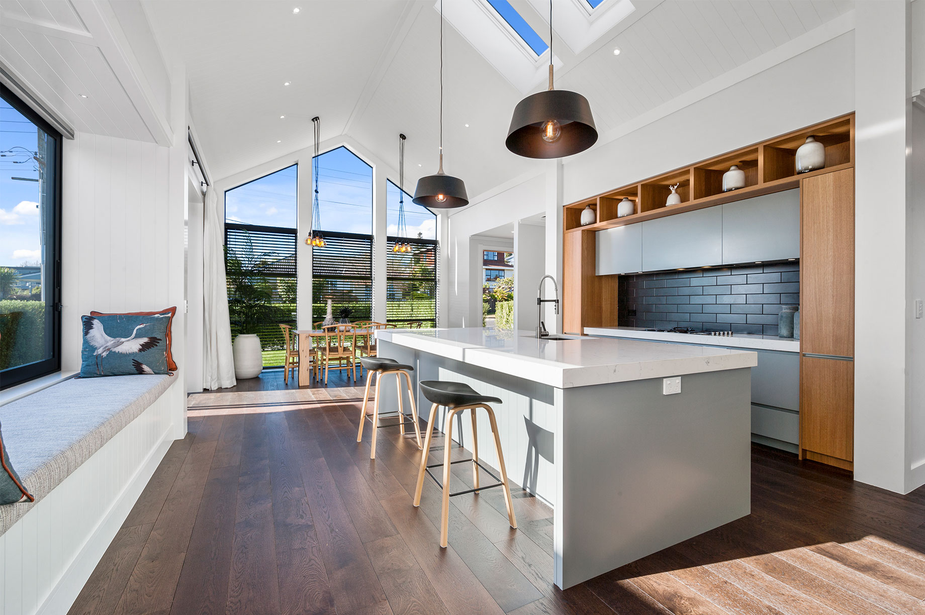 Kitchen and dining area with floor-to-ceiling windows interior