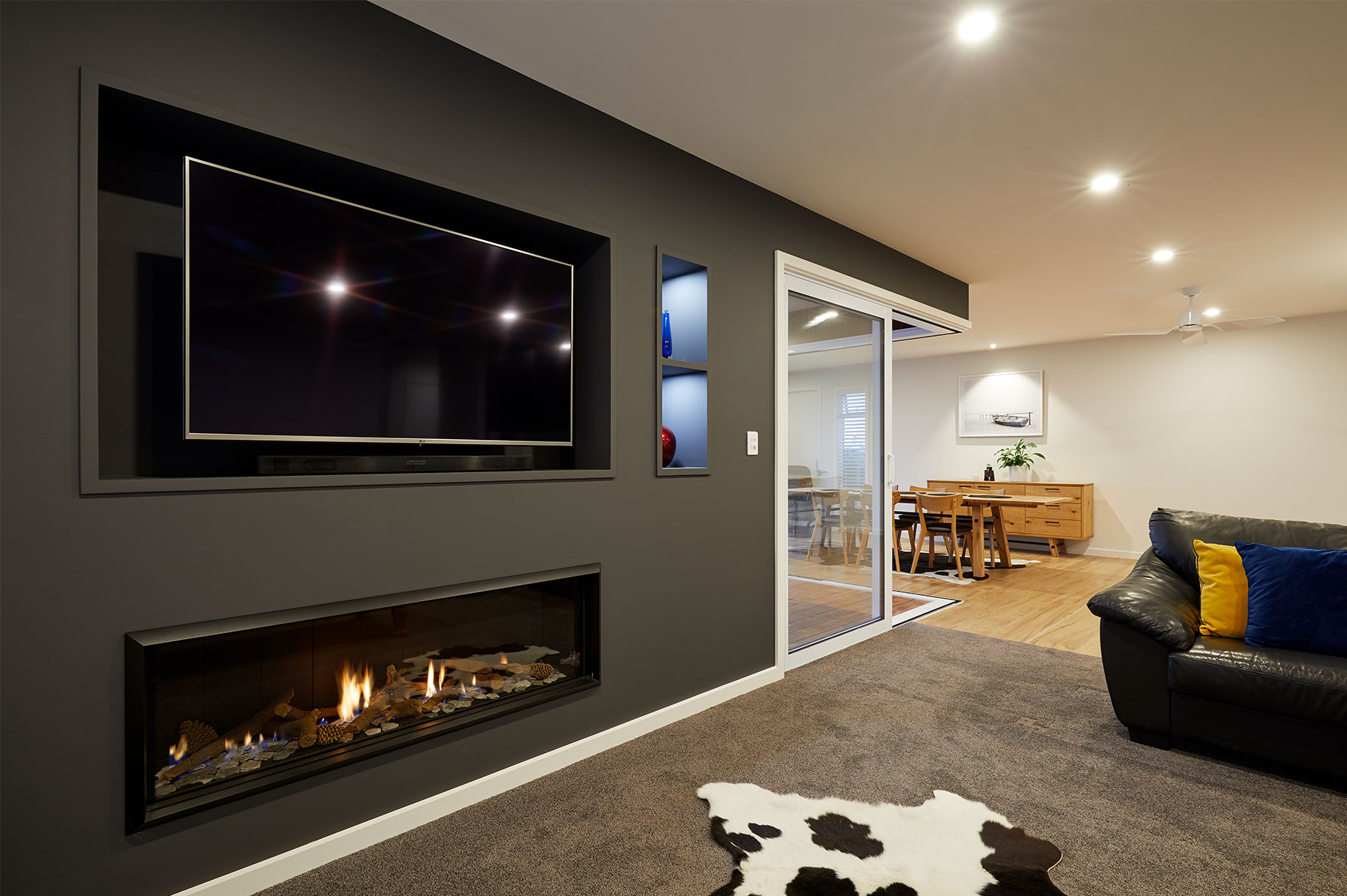 House with a large fireplace in the living room interior