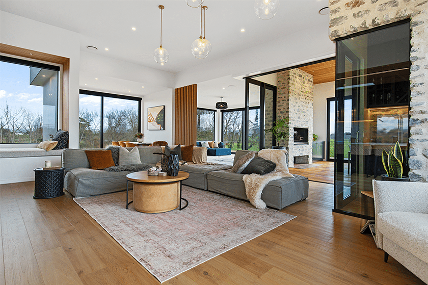 Modern lounge space with entry to outdoor living area