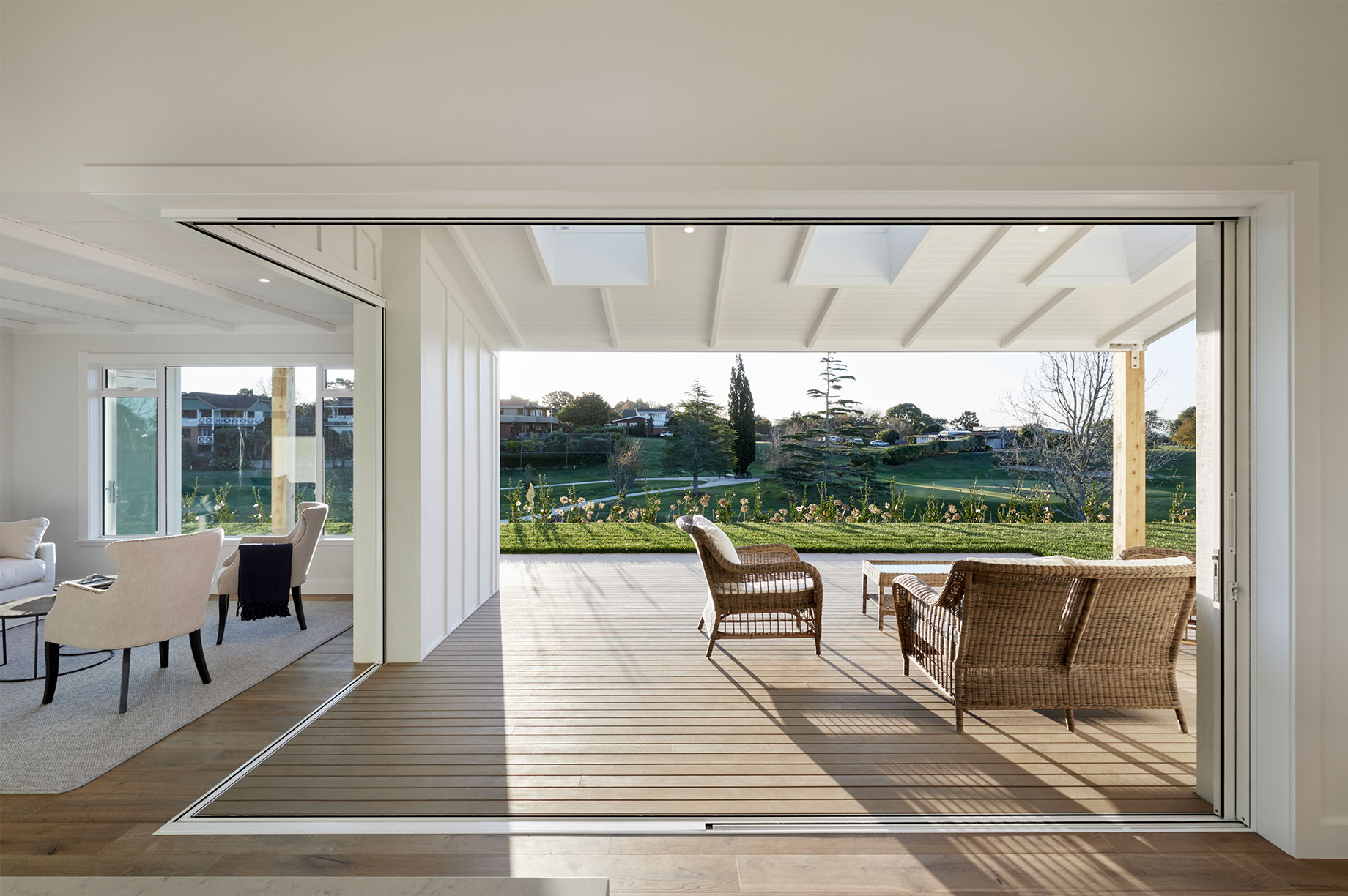 Showhome indoor-outdoor living area on a bright and sunny day