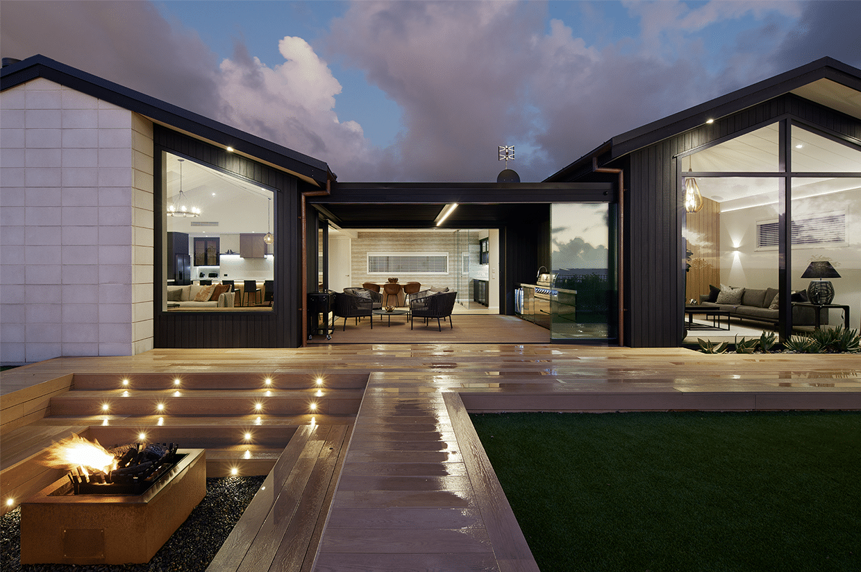 19062-the-manor-external-outdoor-area Outdoor living area with a fireplace