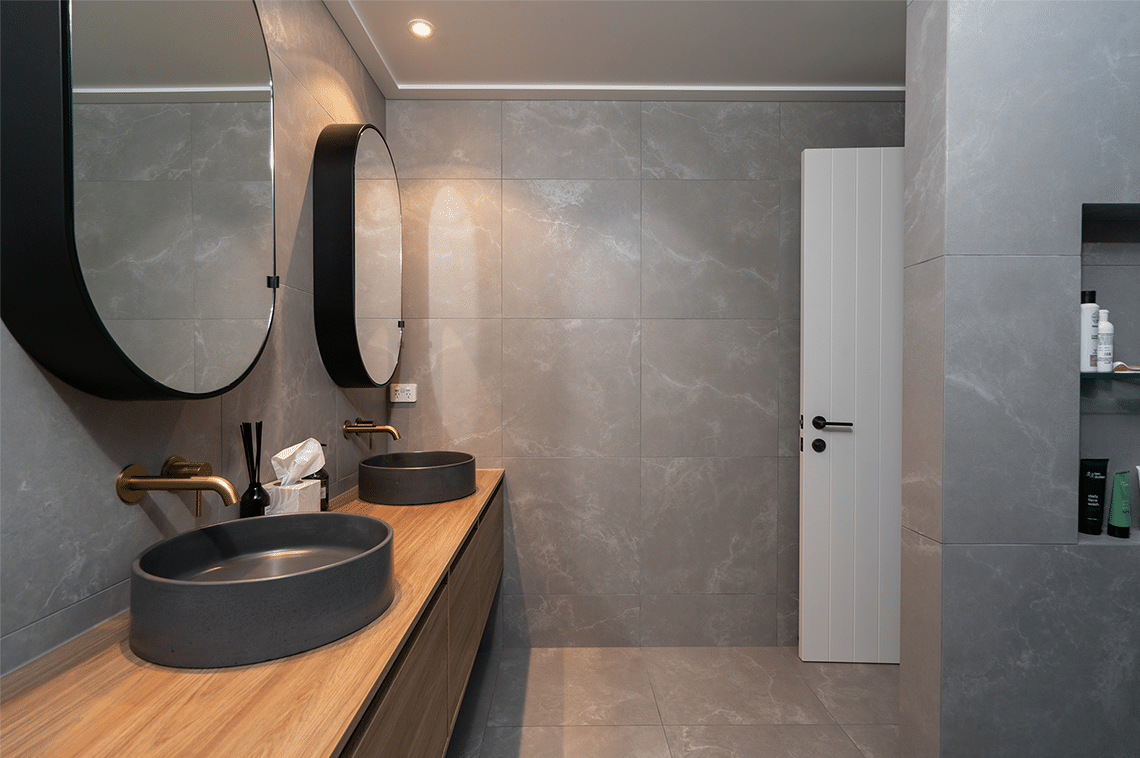 Grey tiled bathroom interior