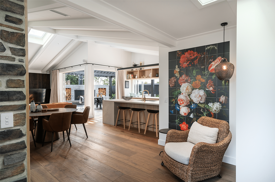 Kitchen and dining area with floral wall art