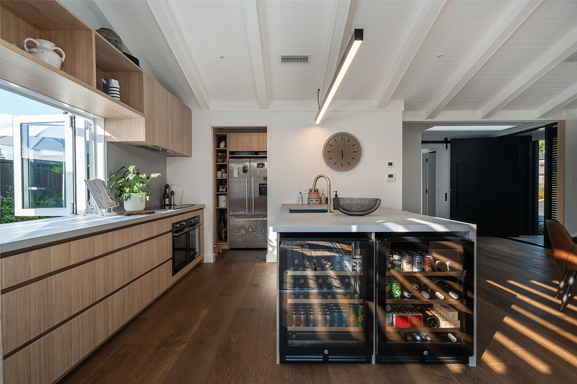 Kitchen interior with a mini bar fridge
