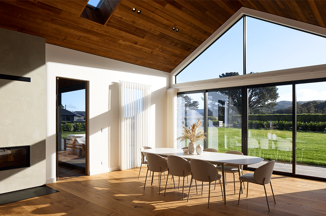 Dining area with floor to ceiling windows