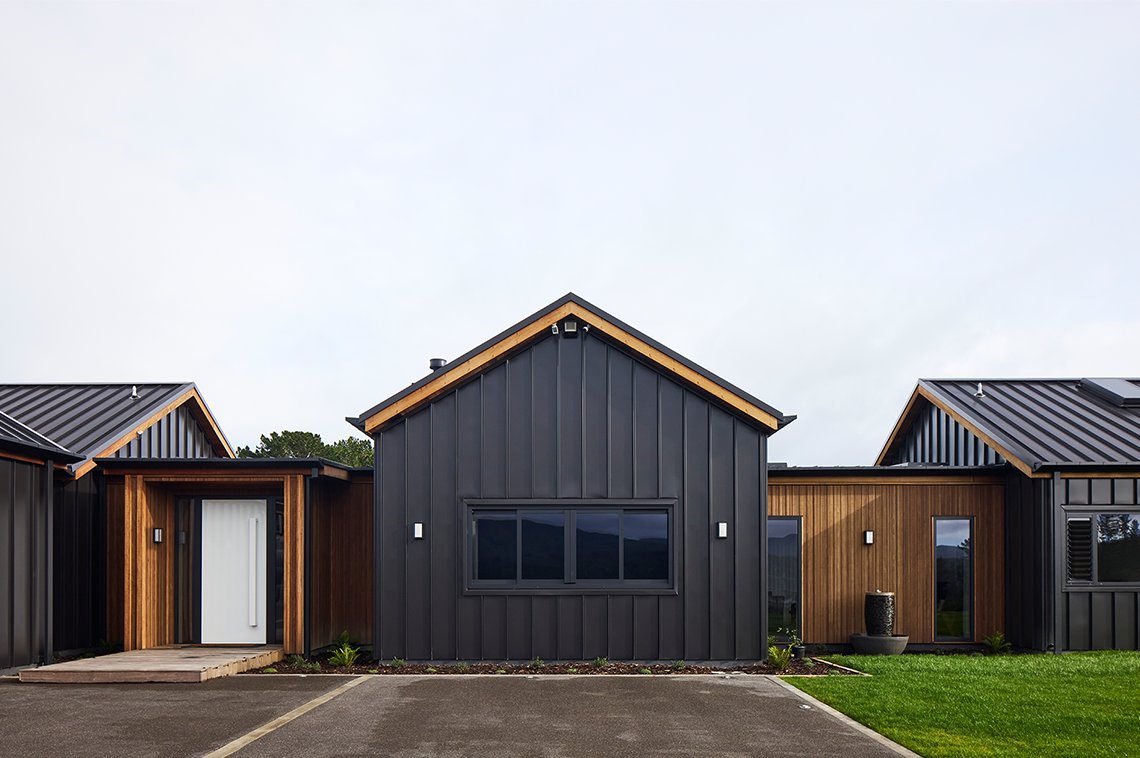 Black and wooden house exterior