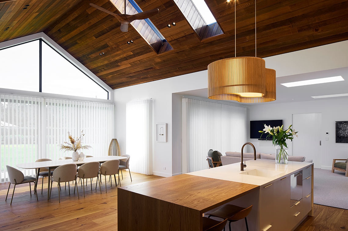 Modern wooden themed dining and kitchen interior
