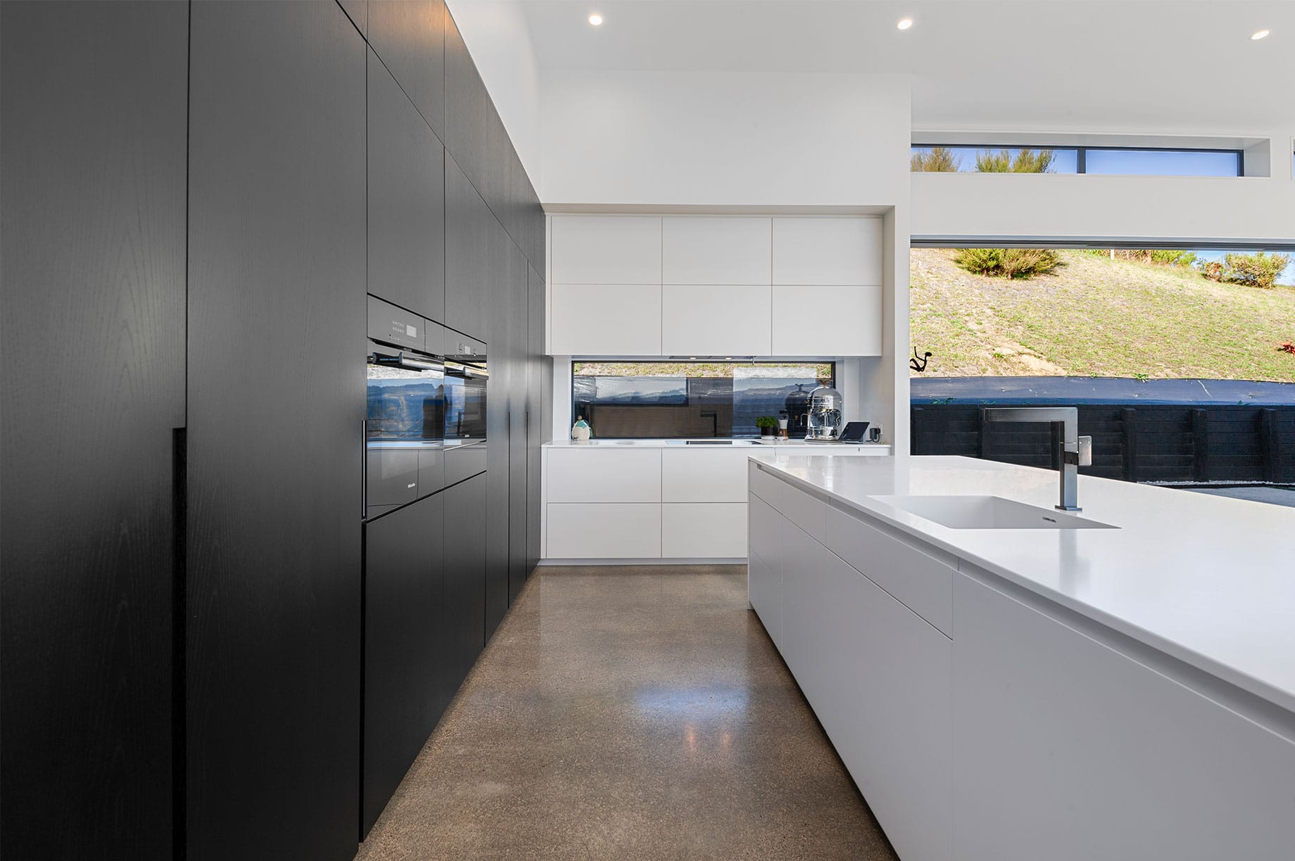 Modern white and black kitchen interior
