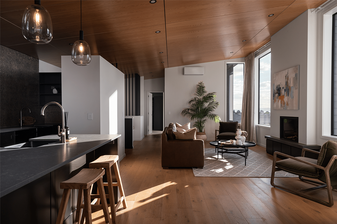 Taupo home dark living space interior