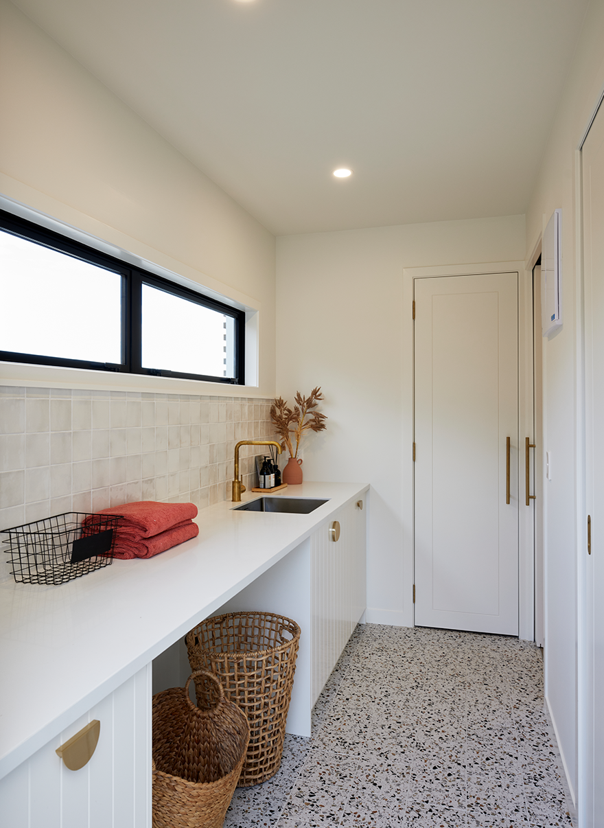 White laundry room of a house in Waikato