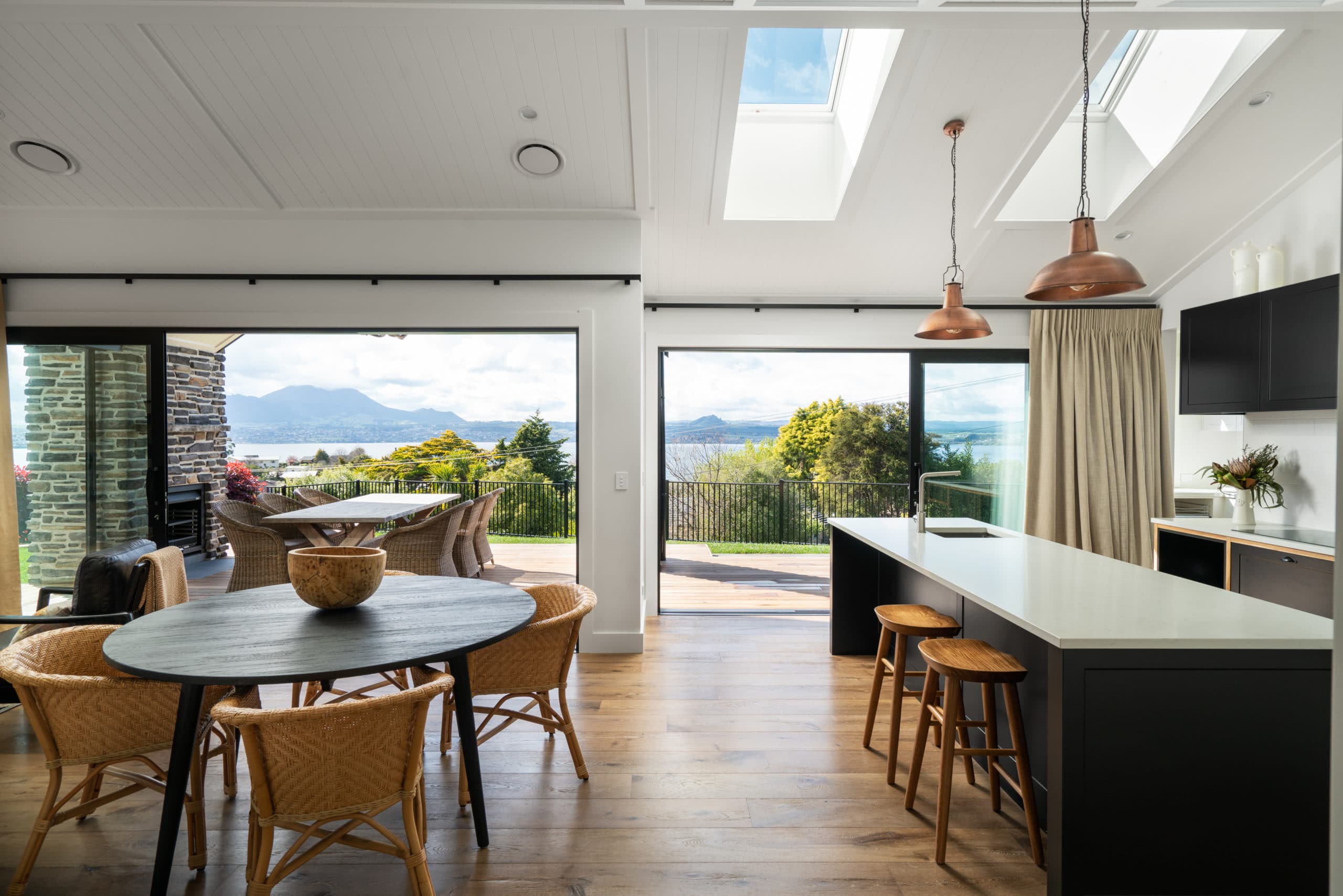 Living space of a home with ceiling windows