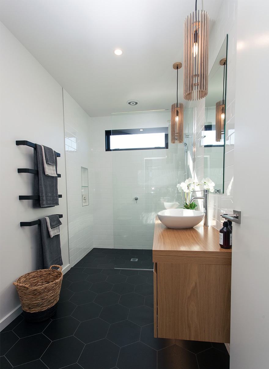Bathroom with black honeycomb tiles interior