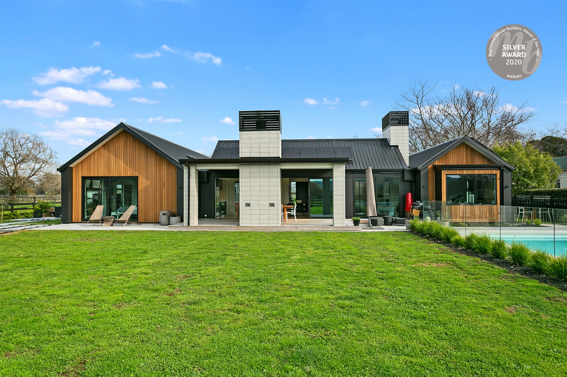 Award winning rural house with a pool exterior