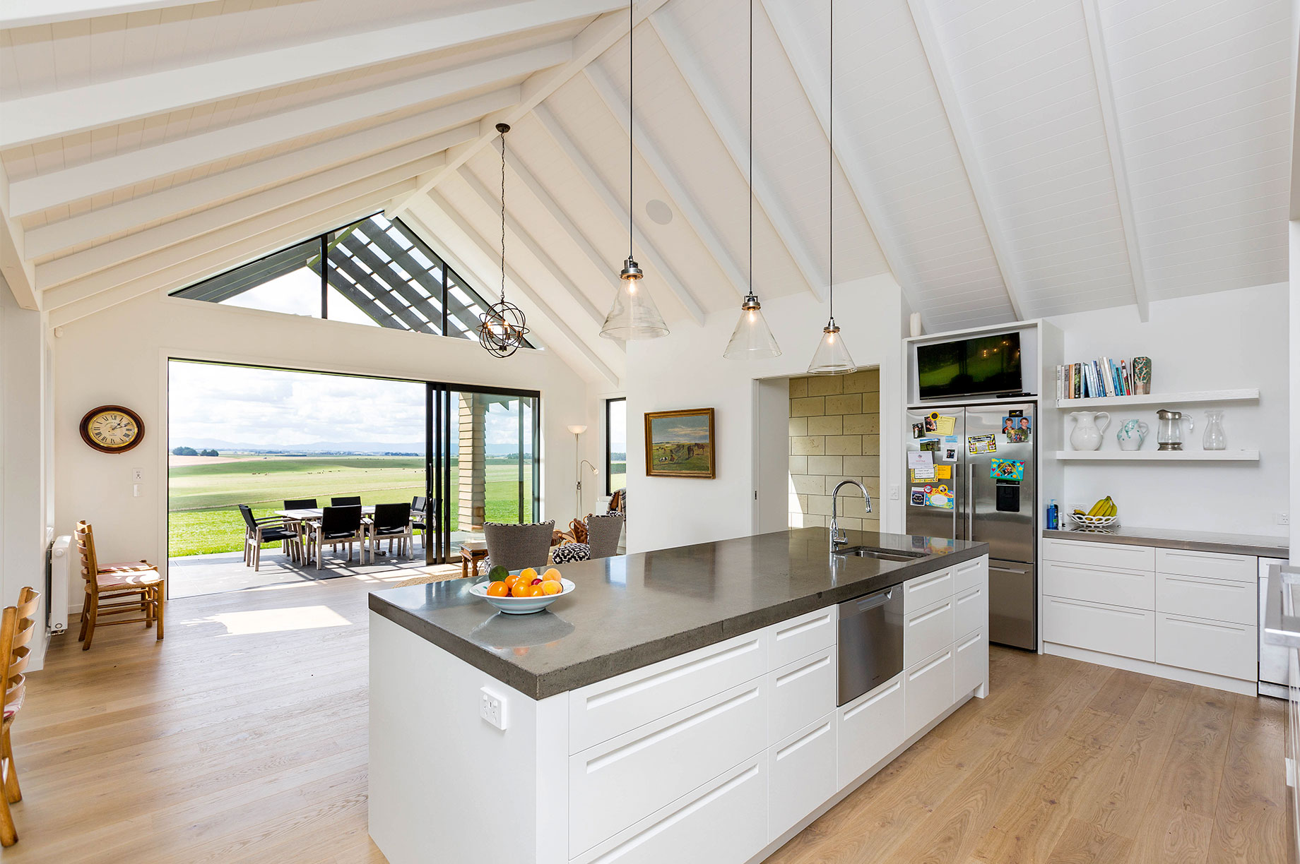 Kitchen and dining area overlooking farmland