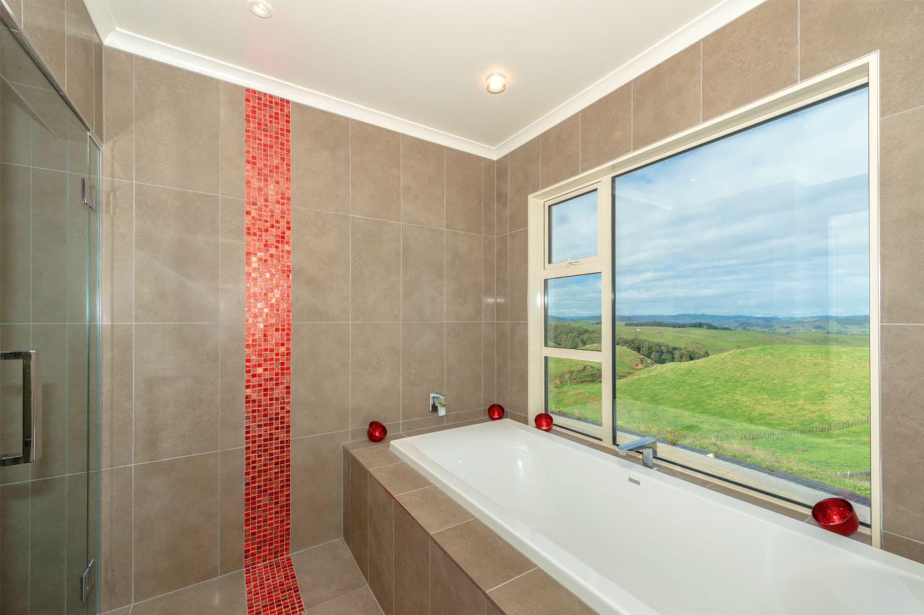 Bathroom with beige and red tiles