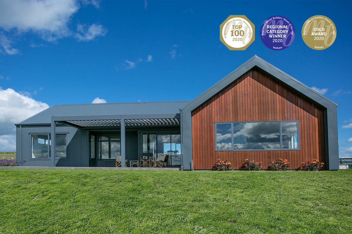 Award winning black and wooden rural home exterior