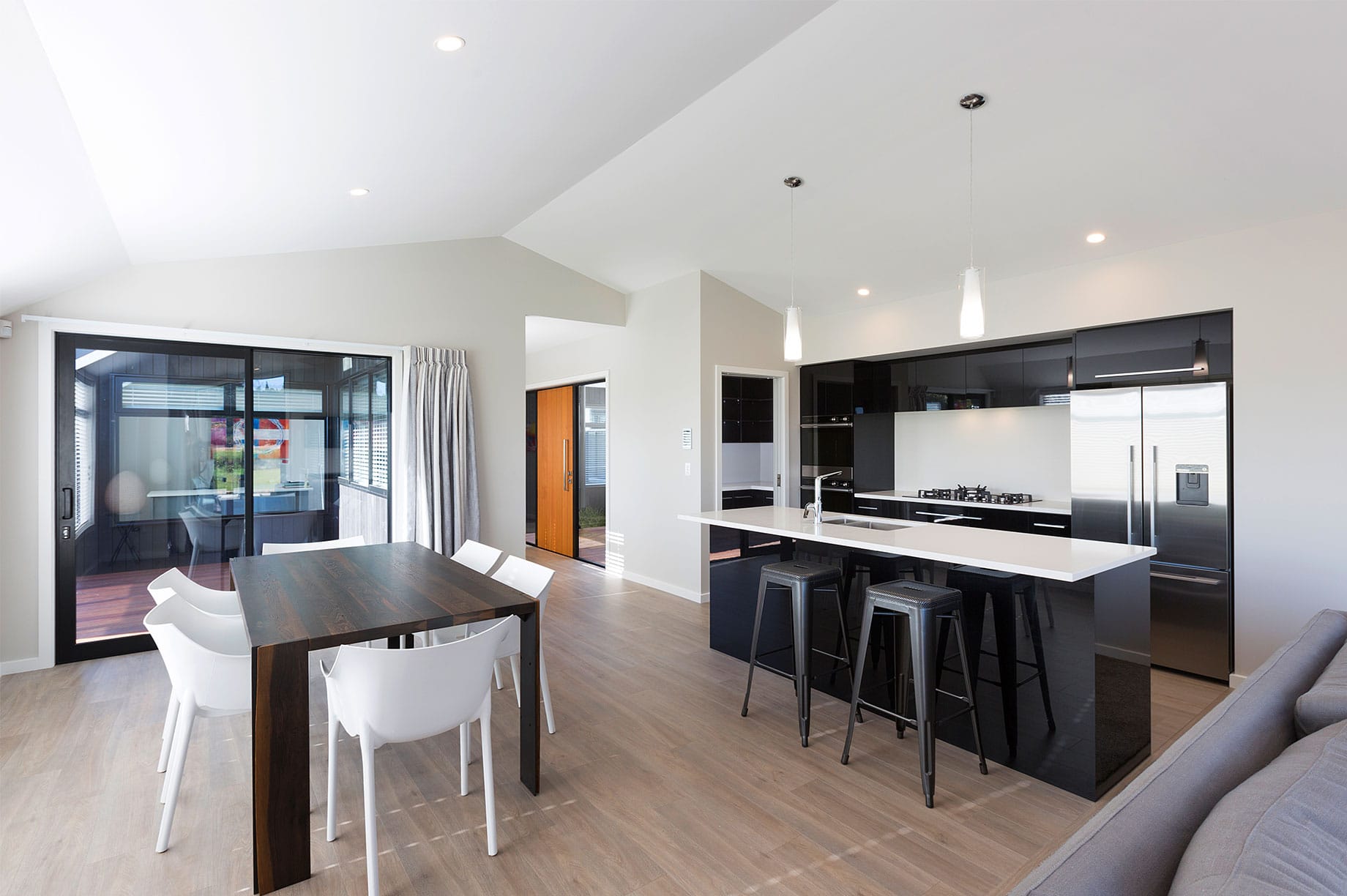 White and black kitchen and dining interior