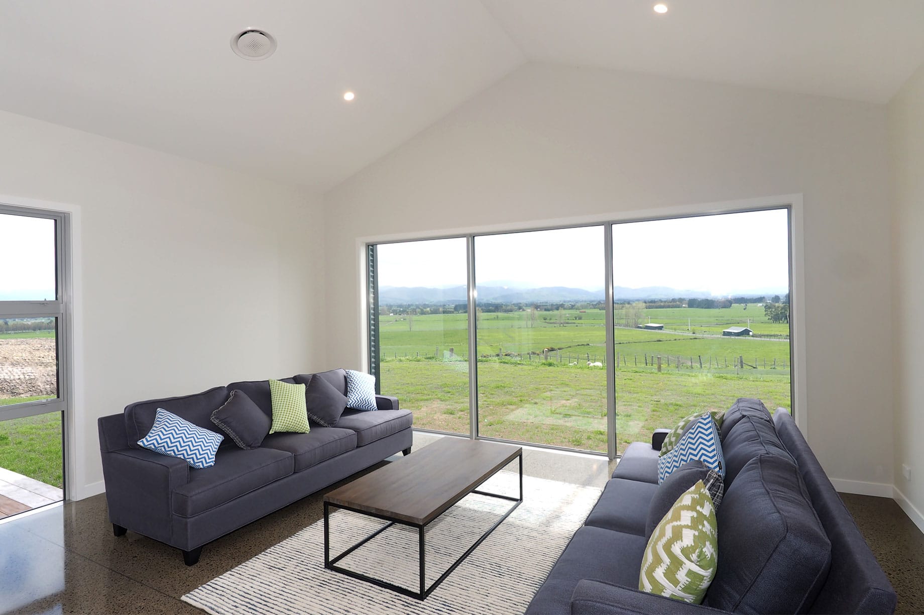 Lounge room with a view of farmland