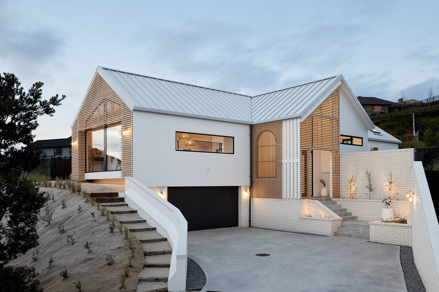 White and wooden show home in Waikato exterior